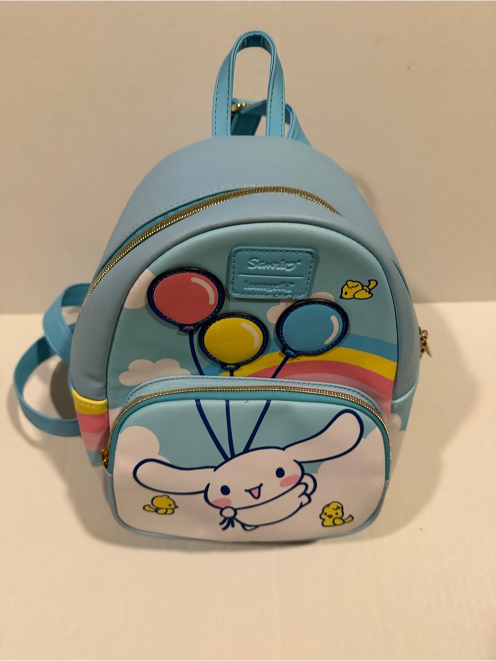 Loungefly Sanrio Cinnamoroll Mini Backpack in Sky Blue with Rainbow Balloons